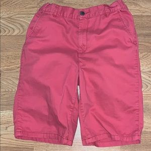 Children place red shorts